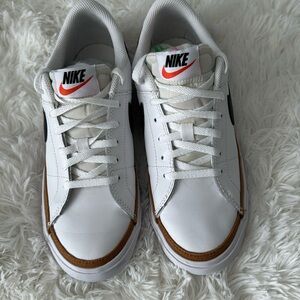 Nike legacy youth shoe, size 5.5. Fits like women’s size 7. Worn a few times